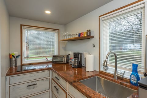 Enjoy wooded views and community scenes as you cook.