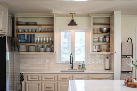 Fully furnished kitchen with views of the lake