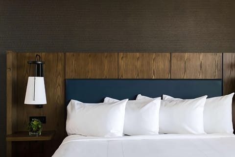 Sink into crisp linens and plush pillows for deep sleep.