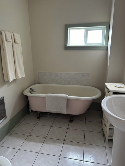 Main floor bathroom, soaking claw-foot tub.