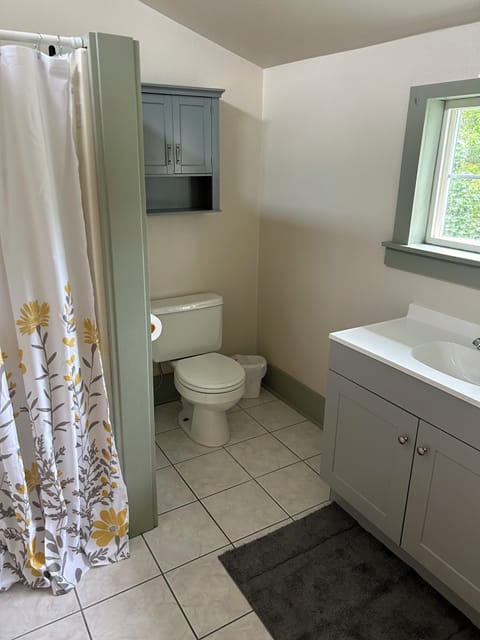 Upstairs bathroom with shower.