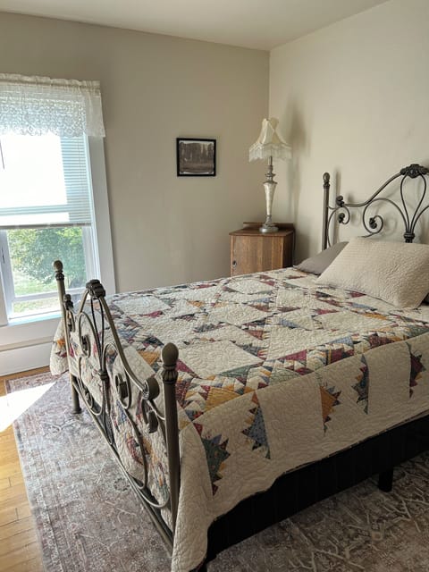 Queen size bed, upstairs