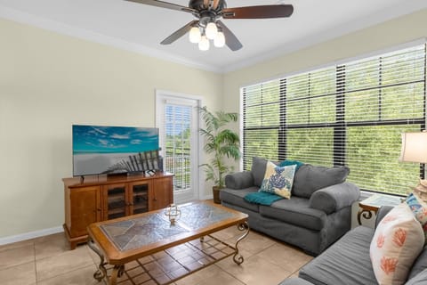 Living Area with Smart TV and Large Windows