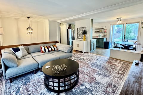 Open concept living, dining and kitchen area for a comfortable stay