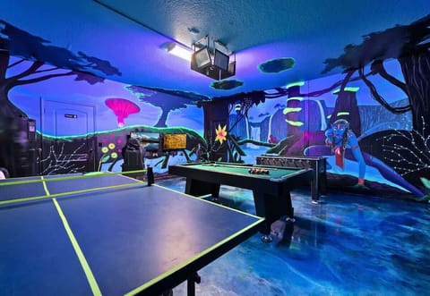 Game Room: Dive into fun with themed decor, pool, foosball, and endless entertainment!