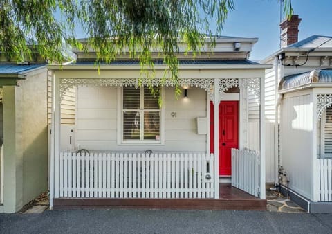 FRONT: Charming exterior with classic detailing and strong street appeal.