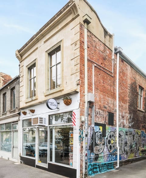 CARLTON COOL: Look out over vibrant Elgin Street in this private first floor, one queen bedroom stylish apartment that can sleep up to four guests with the living room sofa bed. Courtyard garden with barbecue. 