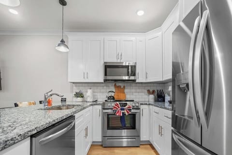 Full kitchen with stainless steel appliances