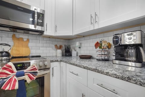 Full kitchen with stainless steel appliances