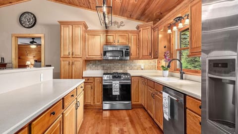Fully stocked kitchen with gas stove