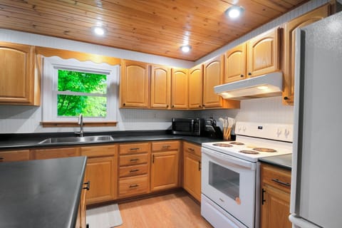 Fully stocked kitchen with everything you need to cook and enjoy meals.