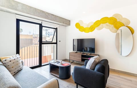 The building contains several similar units, Furniture, decor, and amenities may vary.