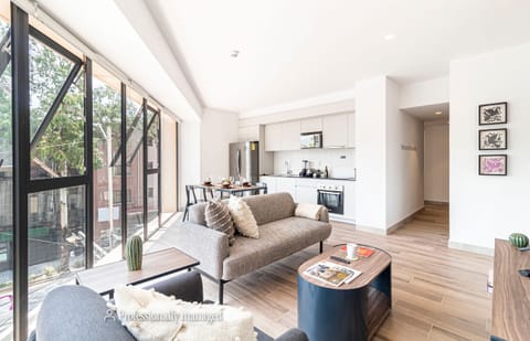 The building contains several similar units, Furniture, decor, and amenities may vary.