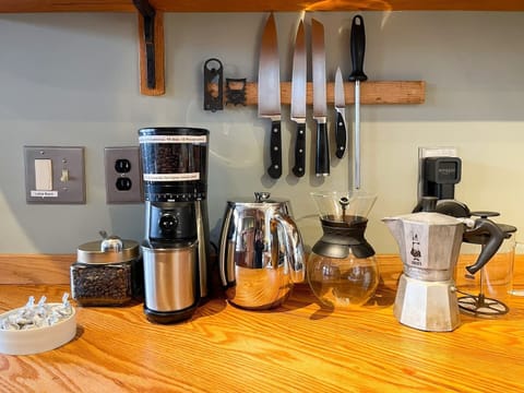 Conley House offers handmade coffee mugs, burr coffee grinder (not pictured), French press,  espresso mocha pot w/ frother, pour over, and a Mr. Coffee, plus a jar full of medium roast beans from Equal Exchange Coffee! Prefer tea? We have that too! 