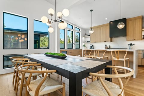 Wood, stone, and glass — natural materials in refined balance.