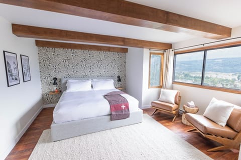 Wake up in your king suite to sweeping mountain views and modern comfort.
