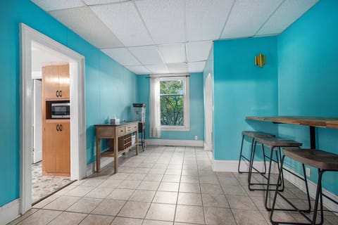 Bonus Room - Bonus room between the kitchen and dining room with sideboard and bar seating for 4