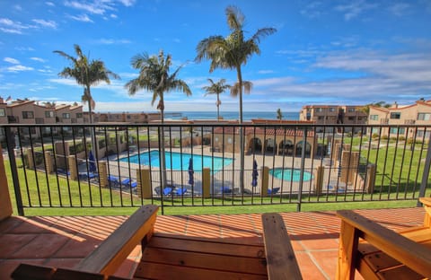 Nestled just steps from the sand, this charming condo offers the perfect spot to unwind and soak up the coastal vibes