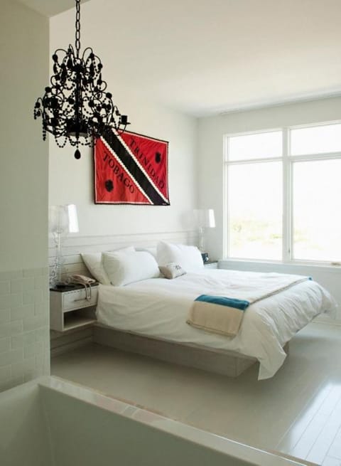 Indulge in an open-concept bath with bright, airy comfort.
