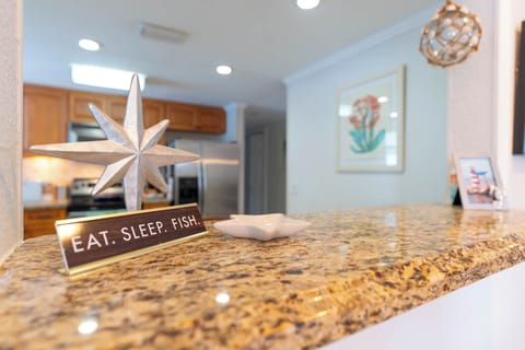 Granite countertops with charming decor touches