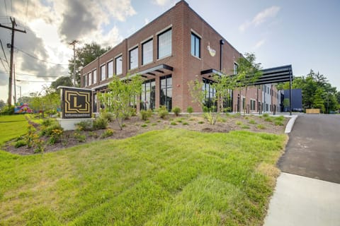 Property Exterior | Shared Parking Lot (1 Vehicle, Parking Pass Provided)