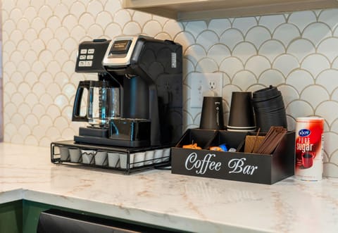 The coffee bar has everything you need for a perfect start to your day, offering style and convenience.