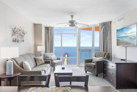Enjoy the beautiful view of the ocean and Cherry Grove Fishing Pier from the living room, Primary Bedroom and Second Bedroom.