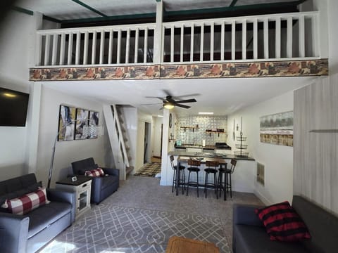 Living space with loft above