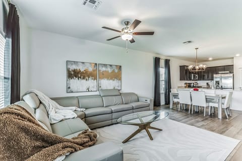 Living room with view of dining room and kitchen