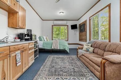 The studio has a queen bed, the couch pulls out into a queen bed, smart TV, WIFI and more