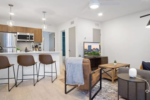 As you take a seat in the living room, the comfortable furniture and tasteful design make it easy to unwind.