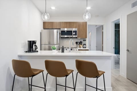 As you take your seat, the dining room's sophisticated design sets the stage for memorable meals and conversations.