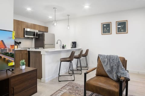 Spacious living room with stylish decor, perfect for unwinding after a day of exploring the local area.