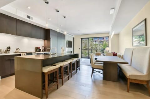 Modern kitchen with an island and open-plan design.