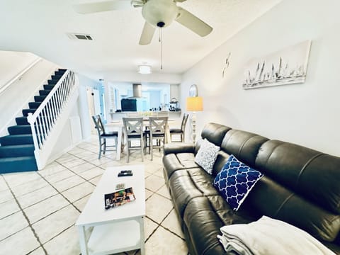 On first floor, the living room and dining room, with view to the upstair area.