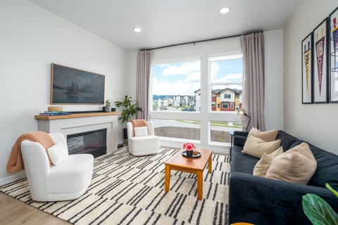 Living Room - electric fireplace, Smart TV.