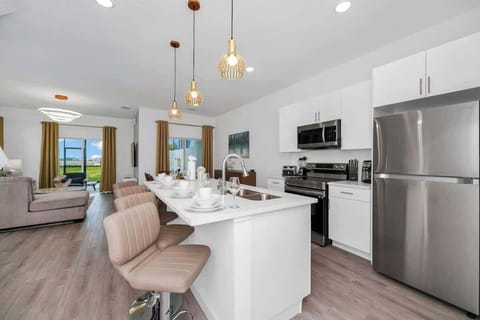 Whip up your favorite meals in the fully stocked kitchen, equipped with all the essentials.