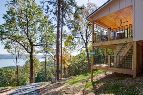 Spacious two-bedroom cabin with lake views, private hot tub, and full kitchen. Perfect for family retreats or group getaways in nature.