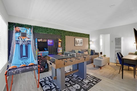 Modern Living Room with 3 in 1 game table, basketball hopp and Arcades