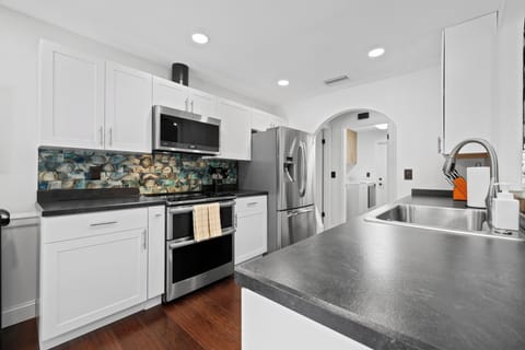 Kitchen fully equipped with modern appliances