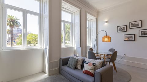 Bright and inviting living area featuring large windows that fill the space with natural light #bright #wonderful