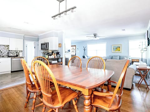 Open and airy! Living area, dining area, and kitchen