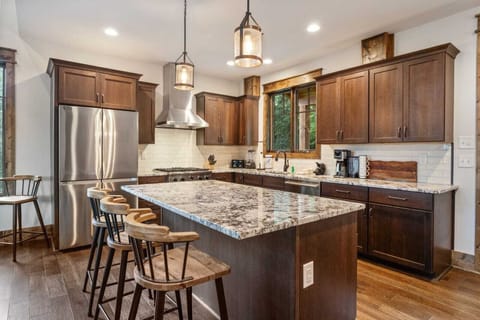 Kitchen with Granite Countertop and Center Island