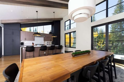 - Dine in style at our large, custom-built dining table, perfect for sharing meals and making memories with family and friends. The bright and open space creates the perfect setting for a feast.