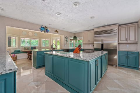 Gather around a welcoming kitchen designed for comfort, connection, and cooking.