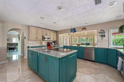 Spacious, well-equipped kitchen — perfect for family breakfasts, group dinners, and everything in between.