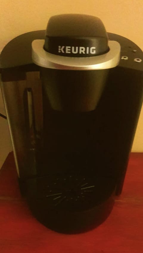 Keurig coffee maker with decaf and regular pods in your coffee station.