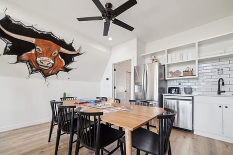 Dining area featuring Bevo mural