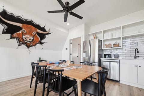 Dining area featuring Bevo mural