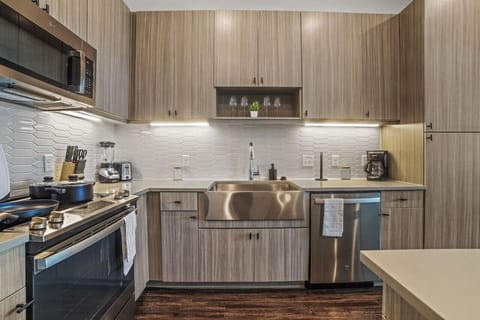 As you take your seat, the dining room's sophisticated design sets the stage for memorable meals and conversations.